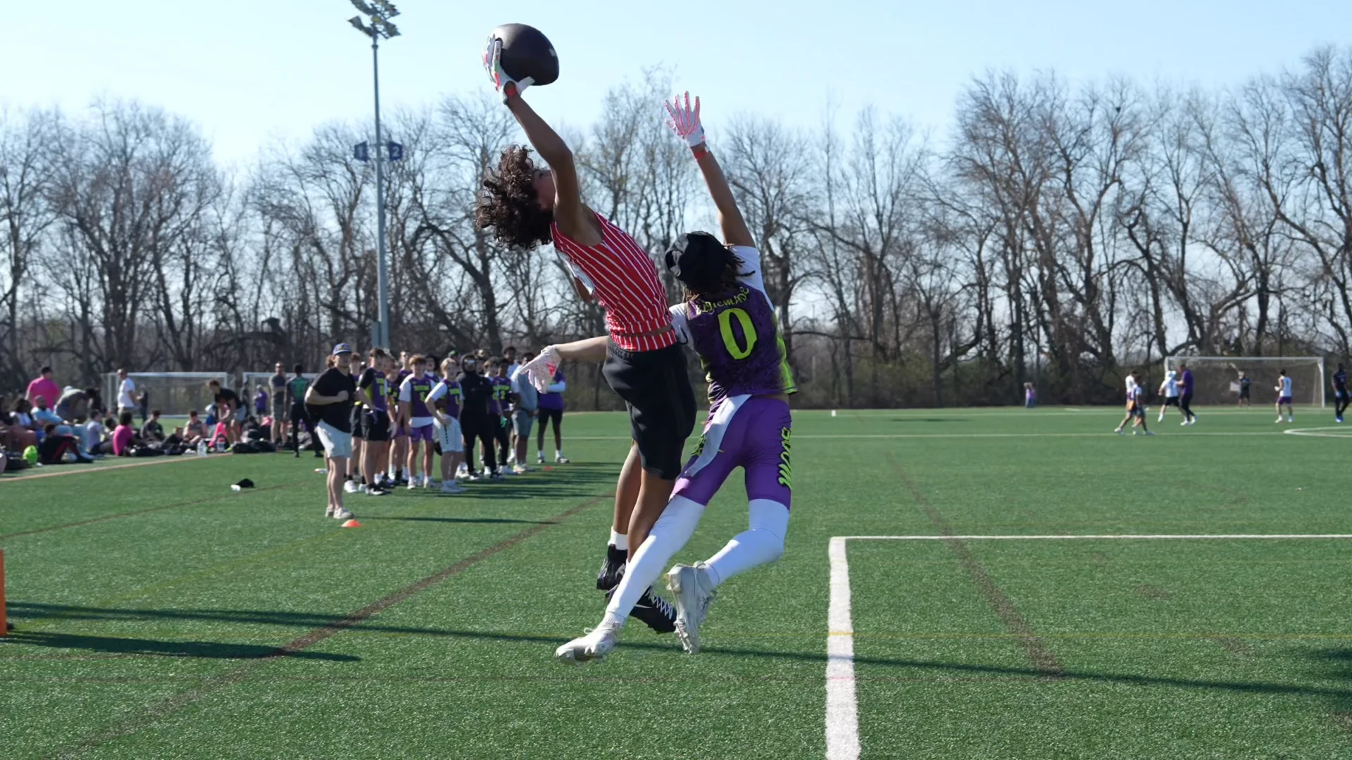 Maxwell Preasha extending for a one-handed catch outdoors